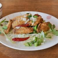 A16. Salt and Pepper Chicken Wings · Hot and spicy.