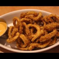 Calamari e Scalogni · Lightly fried calamari tossed with kosher salt and served with remoulade sauce.