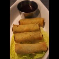 Bella Spring Rolls · Japanese style vegetable egg roll served with sweet and sour sauce.