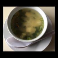 Miso Shiru Soup · Traditional Japanese soup with seaweed, silken tofu and scallions.