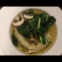 King Gyoza Soup · Dumplings with variety of vegetables in chicken broth.