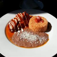 Chile Relleno · Fire roasted poblano pepper stuffed with queso fresco, guajillo-Mexican cinnamon sauce and r...