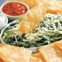 Spinach Artichoke Dip · Creamy spinach blended with a mix of Asiago, mozzarella and provolone cheeses and artichoke ...