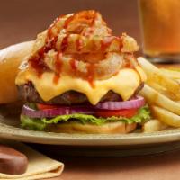 Crispy Onion Burger · Grilled burger topped with fried onion rings, Tony's original sauce and cheddar cheese.