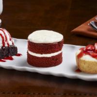 Dessert Trio · Sample 3 delicious mini desserts: raspberry brownie royale, red velvet cake and golden apple...
