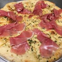 Focaccia di Prosciutto · Thin pizza bread with prosciutto and olive oil.