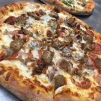 Meat Lover's Pizza · Pepperoni, sausage, sliced meatballs, ham, & bacon