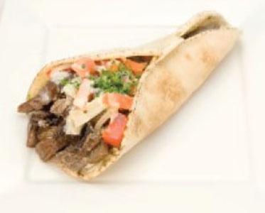 Beef Shawarma Wrap · Delicious marinated beef with lettuce, tomatoes, cilantro, onion and our special house sauce. 