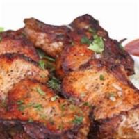 Pork Kabob Plate · Grilled pork tenderloin. Served with hummus, grilled green pepper and tomato, choice of rice...