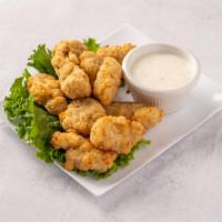Chicken Bites · 1/2 lb. of tender chicken with choice of two dipping sauces.