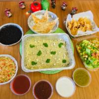 Enchilicious Verdes · Green enchiladas (with tomatillo salsa), Caesar salad, cheese quesadillas, rice, beans, chip...