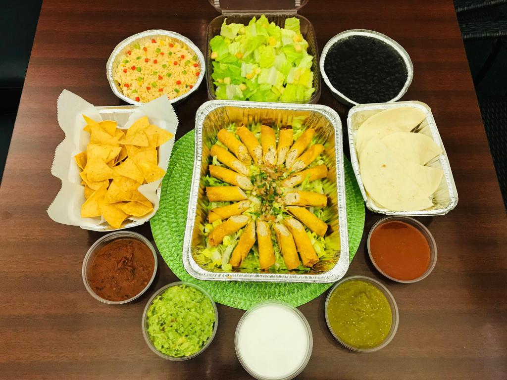 Chicken Flautas Platter · Deep-fried rolled corn tortilla filled with shredded chicken, Caesar salad, cheese quesadillas, rice, beans, chips, salsas, guacamole, and sour cream.