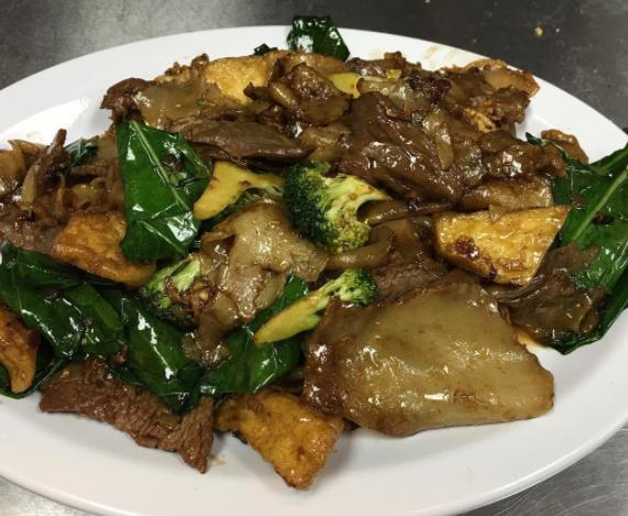 N2. Pad See Ue · Thick noodles. Sauteed thick noodles with broccoli, collard greens and eggs.