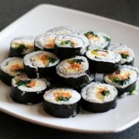Kim-Bap · Korean style roll with egg, pickled radish, crab stick, carrot, and spinach.