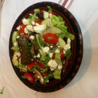 Mediterranean Salad · Romain heart, olives, red peppers, cucumbers, tomatoes, grape leaves, feta, lemon-oil vinaig...