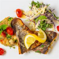 Branzino Fish Filet · Mediterranean sea bass pan seared, over mixed veggies tartar, fresh fennel and arugula coles...