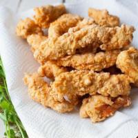 Chicken Tenders · Five piece fresh (never frozen) all white meat chicken breast breaded and deep fried, served...