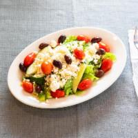 Greek Salad · Romaine lettuce, tomatoes, onions, green peppers, cucumbers, Kalamata olives, feta cheese, o...
