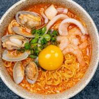 Seafood Ramyun · Ramyun, shrimps, clams, squid, onions, egg, and scallions. Spicy.