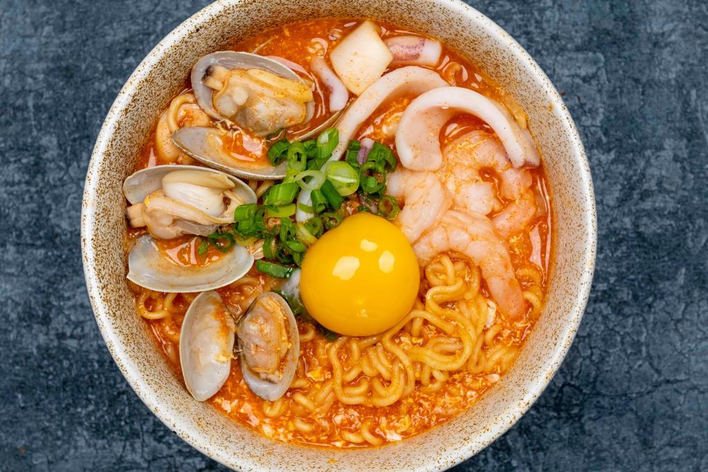 N6. Seafood Ramyun · Ramyun, shrimps, clams, squid, onions, egg and scallions. Spicy.