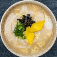 Sliced Rice Cake Soup · Sliced rice cakes, egg, seaweed, scallions, and sesame oil in hot soup.
