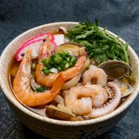 Seafood Udon · Thick noodle, shrimps, clams, squid, cabbage, carrot, and scallions.