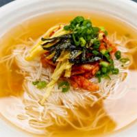 Janchi Noodle · Noodle, onions, scallions, egg, kimchi, dried seaweed, and cucumber in hot soup.