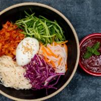 N17. Bibim Noodle · Noodle, cucumber, kimchi, pickled radish, red cabbage, egg, sesame oil and hot sauce. Spicy.