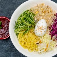 N18. Jolmyun · Thick noodle, cucumber bean sprout, cabbage, red cabbage, egg, sesame and sesame oil with ho...