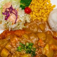 C3. Curry Pork Cutlet · Pork cutlet, rice, lettuce and corns with curry sauce.