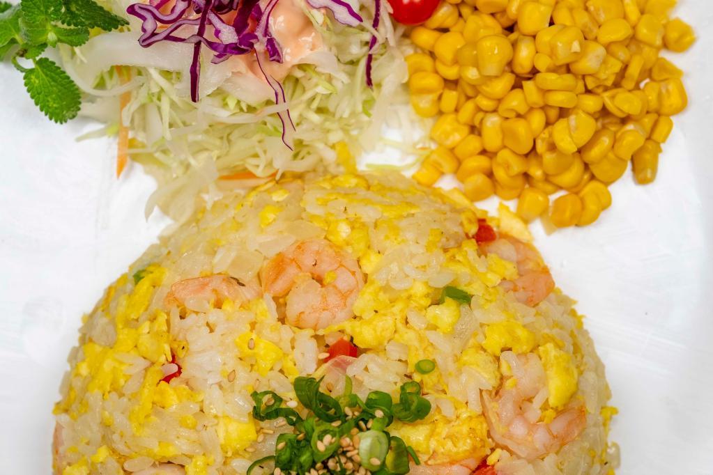 Shrimp Fried Rice · Rice, shrimp, onion, paprika, egg, scallion, salt, pepper, and sesame.