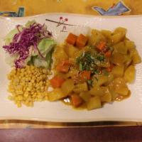 Curry Rice · Rice, onion, potato, carrot, and scallion with curry sauce. Mild.