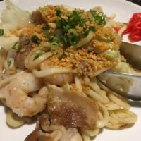 Garlic Udon · Cabbage, shrimp, calamari, crispy garlic, green onion and pork belly. fried noodles made exc...