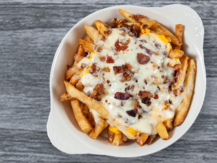 Krazy Fries · Served with cheddar cheese sauce, mozzarella and bacon bits, served with ranch.