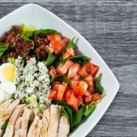 Cobb Salad · Bacon, grilled chicken, hard-boiled egg, fresh tomatoes, Gorgonzola and mixed greens.