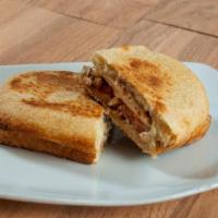 Chicken Ranch Panini · Grilled chicken breast, bacon, tomatoes, provolone and ranch dressing.