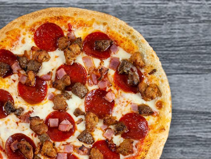 Quattro Meat Pizza · Pepperoni, imported ham, sweet Italian sausage, meatballs, mozzarella and our sauce. No substitutions please.