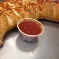 Calzone · Calzones, sauceless with ricotta, Parmesan, mozzarella cheese and your favorite toppings. Sa...