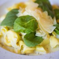 fiocchetti di pera · House made fiocchetti stuffed with gorgonzola and pear served in a butter spinach and shaved...