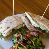 Caprese panino · Housemade fresh bread toasted in our wood-burning oven, Fresh mozzarella cheese, tomatoes an...