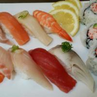 Deluxe Assorted Sushi · 9 Pieces nigiri with 6pcs cali roll.