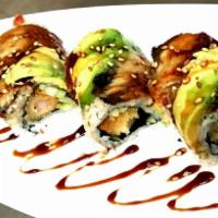 Dragon Roll · Shrimp tempura, cucumber and Top: unagi, avocado , sesame seed, unagi sauce.