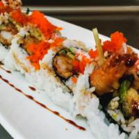 Tempura Roll · Shrimp, crab, cucumber, avocado and Top: unagi sauce, masago.
