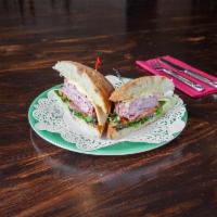 The North Shoreview Sandwich · Black forest ham, Havarti cheese, baby greens, tomato, mayonnaise, Dijon mustard, and red on...