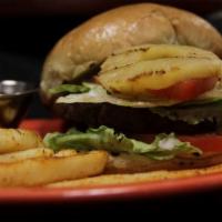 African Burger · Beef burger with onion, tomatoes, lettuce, mayo, cheese and grilled pineapple.