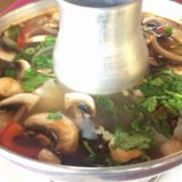 Tom Yum Seafood Basil Soup · Mixed seafood, mushroom, tomato, onion and basil in tom yum broth. Large served with hot pot...