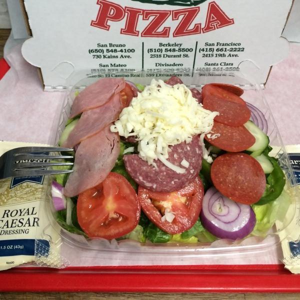 Chef's Salad · Lettuce, tomatoes, onions, bell peppers, cucumber, salami, pepperoni, Canadian bacon and mozzarella.