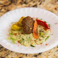 Hummus with Falafel · Includes with choice of pita and toppings.