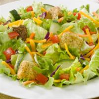 Side House Salad · Carrots, green peppers, tomatoes, cucumber, cheddar cheese and croutons.