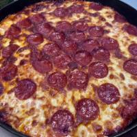 Build Your Own Pan Crust Pizza · Extra thick but light with a crispy bottom.